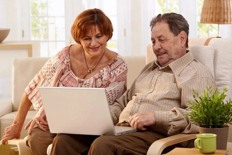 Elderly Couple Using Computer Computer